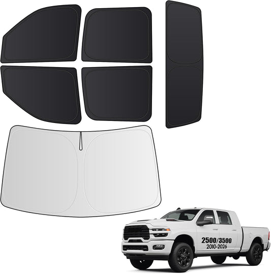 Set of car accessories including sunshades and floor mats with a white truck on a white background.