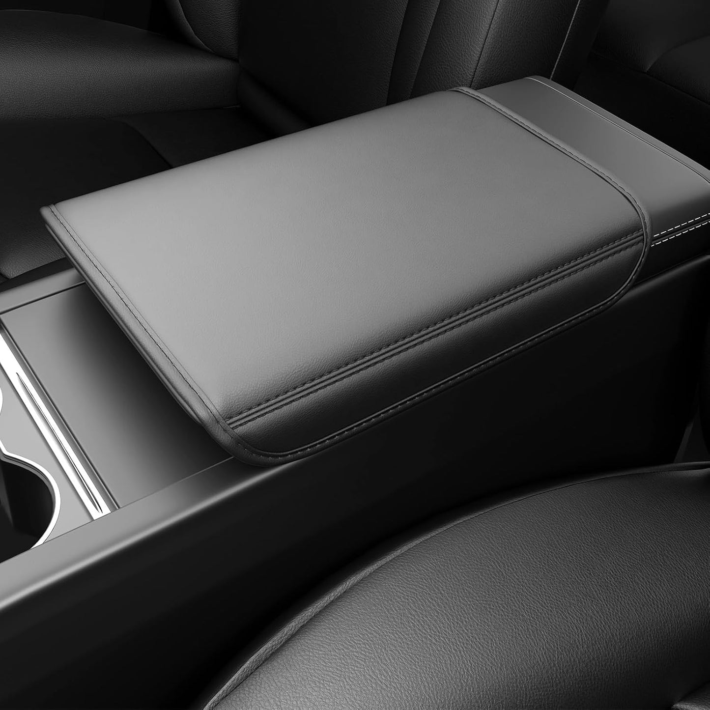 Gray armrest cover in a car interior