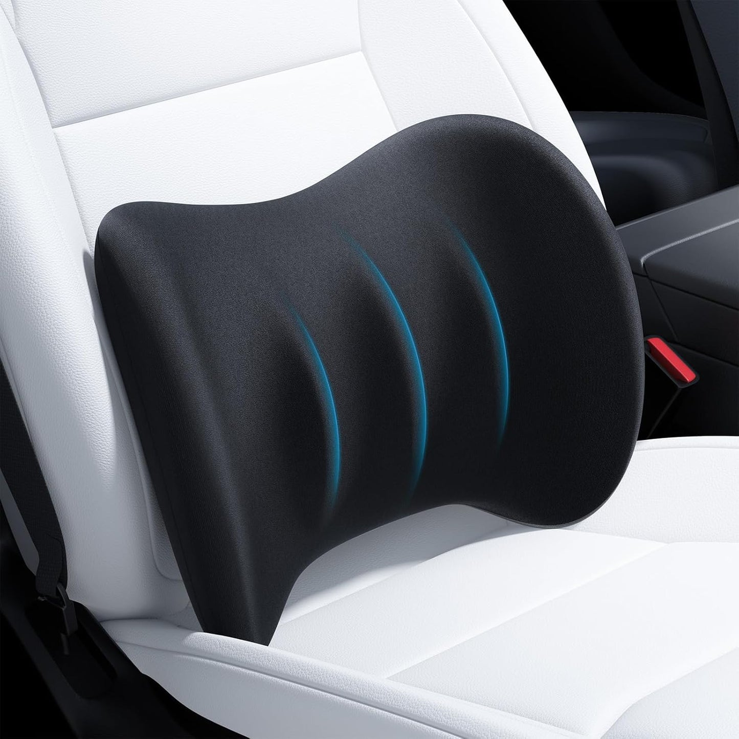 Black ergonomic pillow on a car seat