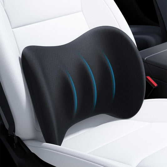 Black ergonomic pillow on a car seat
