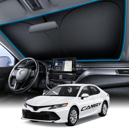 Car interior with steering wheel and dashboard, overlaid with a white Toyota Camry car.
