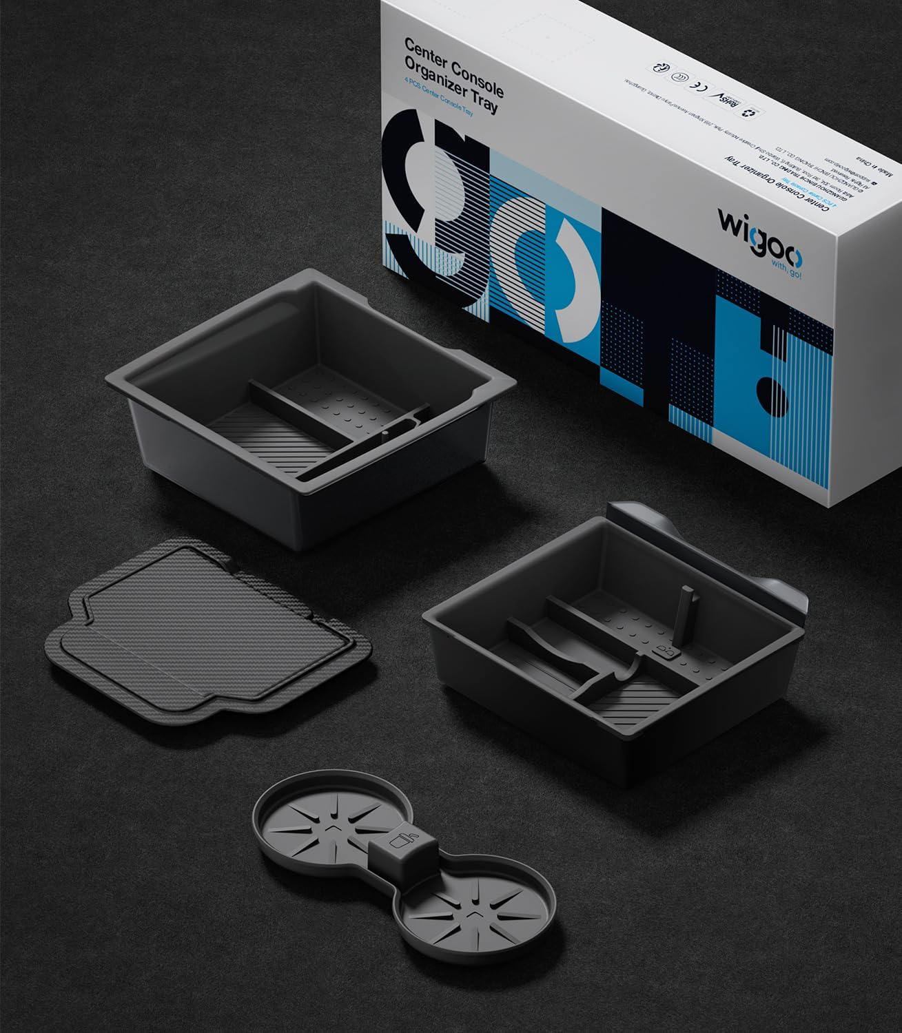 Black organizer tray with components and wigoo packaging on a dark surface