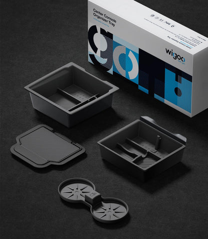 Black organizer tray with components and wigoo packaging on a dark surface