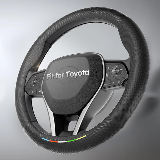 Steering wheel with Toyota logo on a gray background