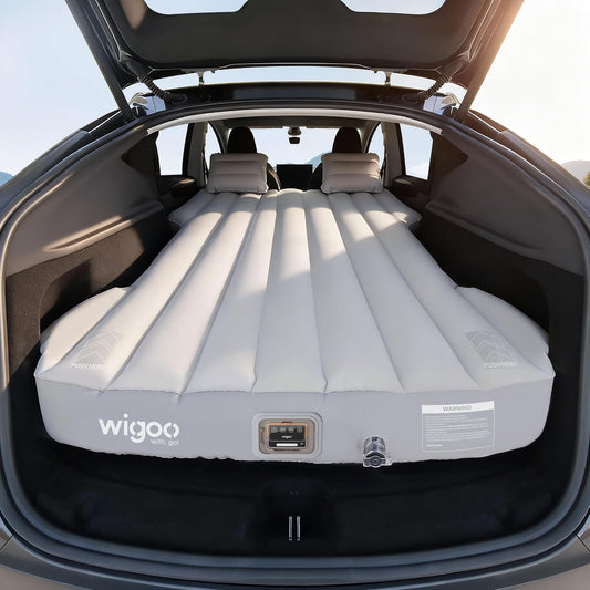 Inflatable mattress in the trunk of a car with wigoo branding.