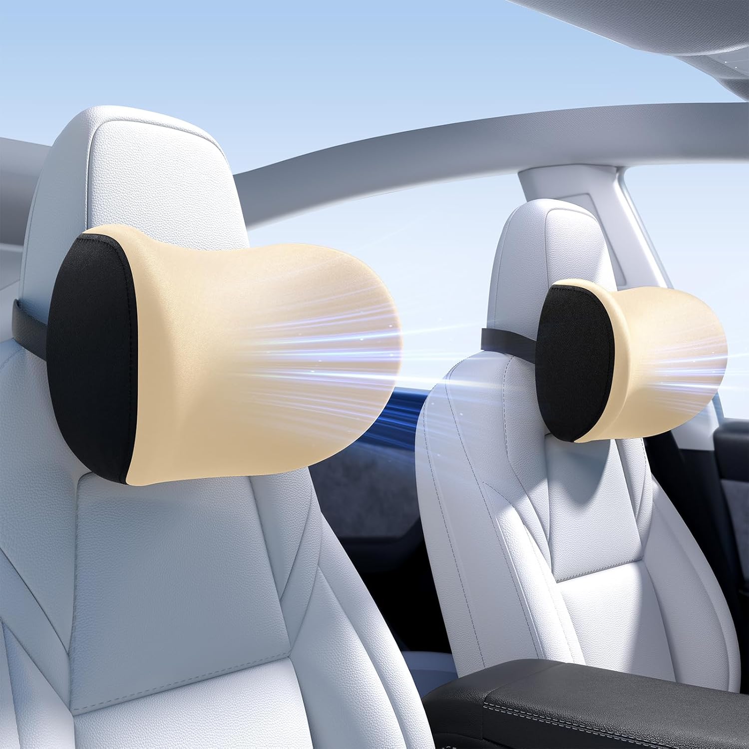 Car headrest pillows with beige cushions and black straps installed in a vehicle.