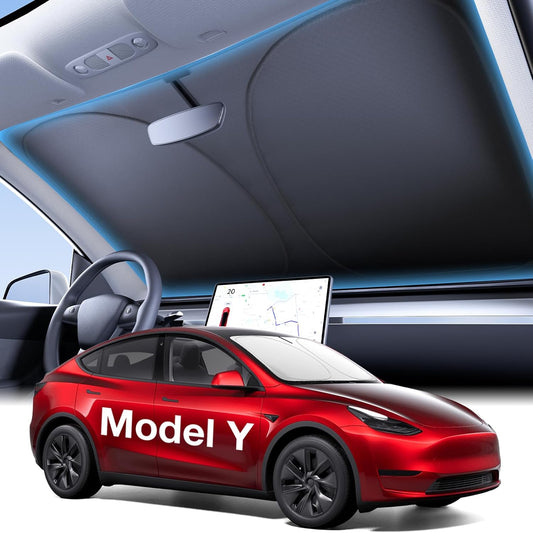 Red Tesla Model Y car with a close-up of a car interior in the background