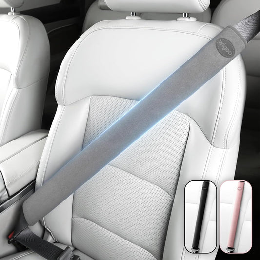 Car seat with a gray safety belt and a close-up inset of the belt's design.