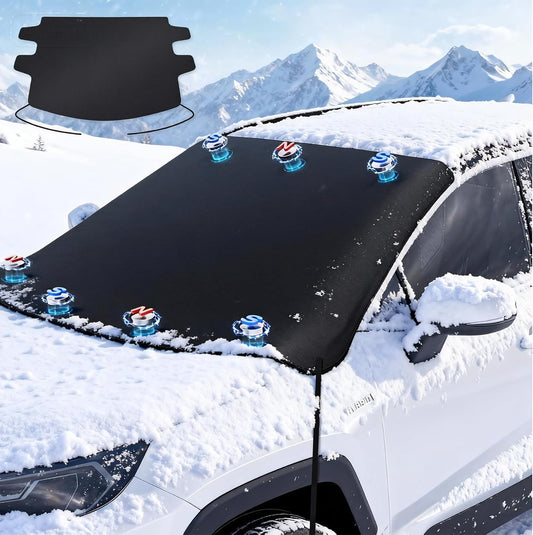 Car windshield cover on a snow-covered car with mountain background