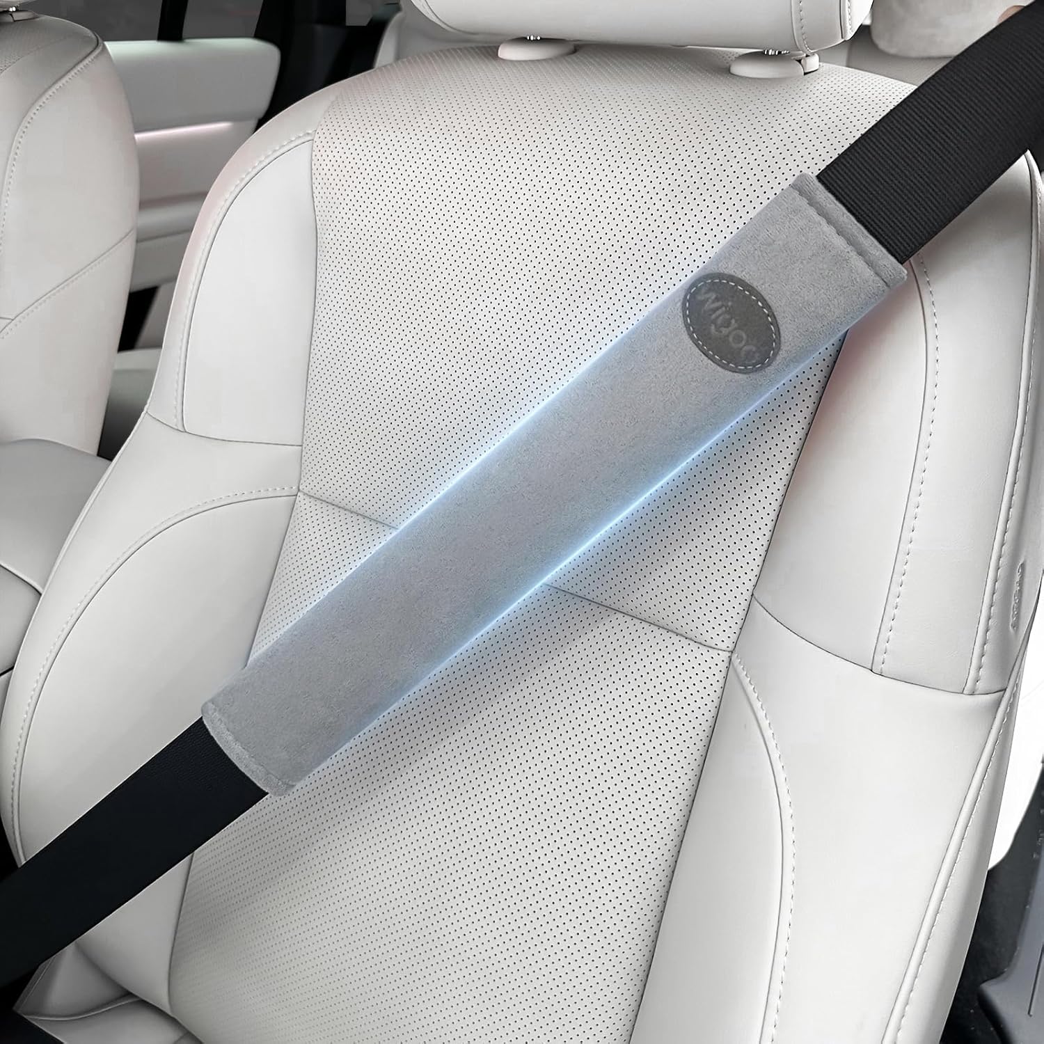 Car seat with a seat belt and a blue light attached to it