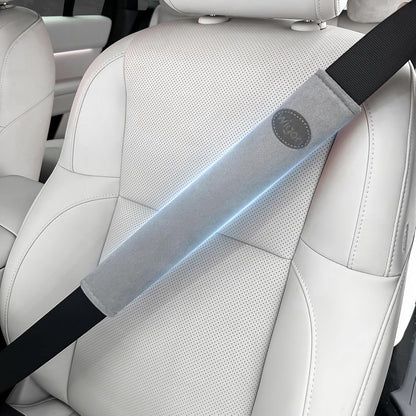 Car seat with a seat belt and a blue light attached to it