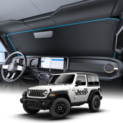 Jeep interior with dashboard and steering wheel, featuring a Jeep logo on a white background.